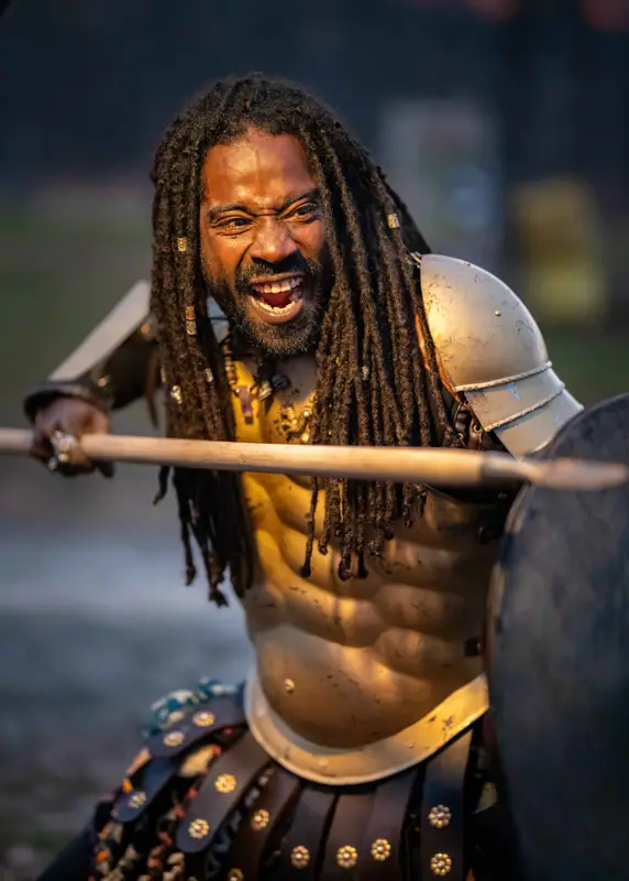 A fighter advancing with a spear